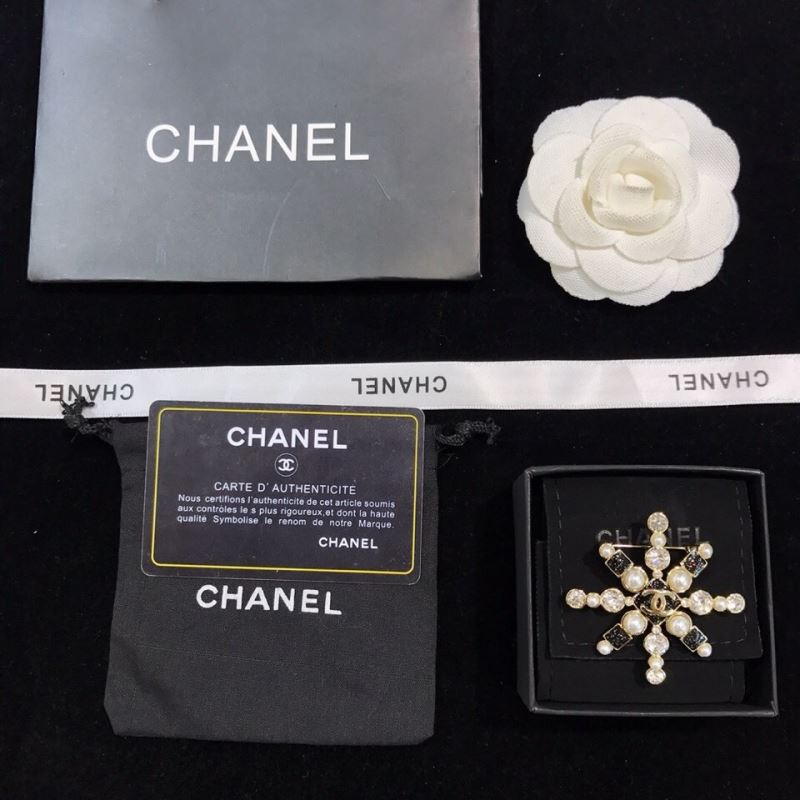 Ch*el brooches